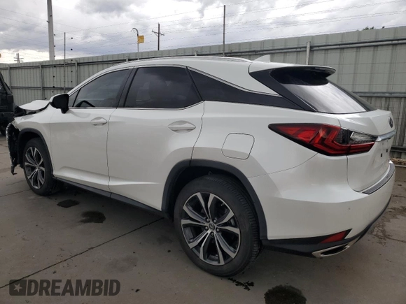 2021 Lexus RX 350 with VIN JTJHZMDA7M2051652, listed as a Copart auction lot 57218985 with 17,013 mi miles and Salvage title. Bid and sale history available at DreamBid. Image 2.