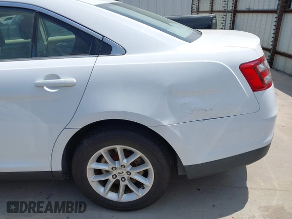 2015 Ford Taurus SE with VIN 1FAHP2D8XFG105029, listed as a IAAI auction lot 42068632 with 164,098 mi miles and . Bid and sale history available at carsss.com. Image 12.