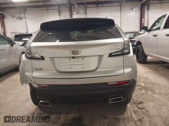2021 Cadillac XT4 FWD Sport with VIN 1GYFZER40MF061378, listed as a IAAI auction lot 41744219 with 33,750 mi miles and . Bid and sale history available at DreamBid. Image 16.