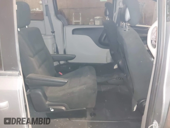 2015 Dodge Grand Caravan SE with VIN 2C4RDGBG1FR738659, listed as a IAAI auction lot 41547350 with 96,621 mi miles and . Bid and sale history available at DreamBid. Image 8.