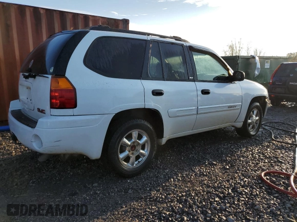 2003 GMC Envoy SLE z VIN 1GKDS13S532369187, wystawiony jako Copart lot #79922934 z przebiegiem 223 997 mil mil oraz Szkoda całkowita • Salvage title. Historia ofert i sprzedaży dostępna na DreamBid. Obrazek 3.