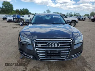 2012 Audi A8 z VIN WAURVAFD2CN021722, wystawiony jako Copart lot #58353745 z przebiegiem 117 302 mil mil oraz Szkoda całkowita • Salvage title. Historia ofert i sprzedaży dostępna na DreamBid. Obrazek 5.