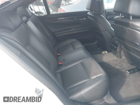 2015 BMW 7 Series 750Li xDrive with VIN WBAYF8C56FD654765, listed as a IAAI auction lot 40734550 with 133,848 mi miles and . Bid and sale history available at carsss.com. Image 8.
