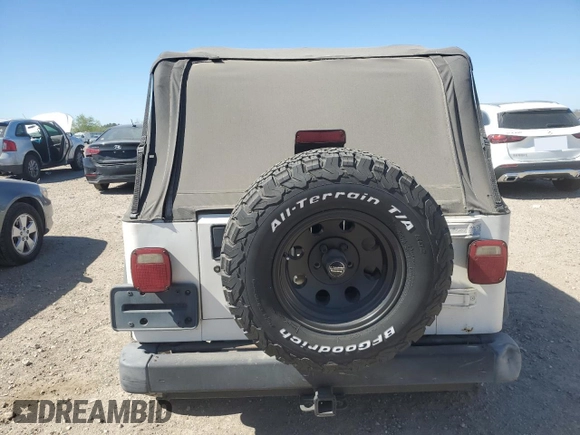 1997 Jeep Wrangler SE with VIN 1J4FY29PXVP411817, listed as a Copart auction lot 48755615 with 125,284 mi miles and Salvage Title. Bid and sale history available at DreamBid. Image 6.