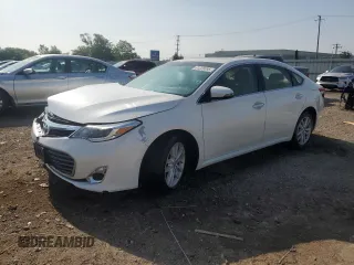 2013 Toyota Avalon XLE with VIN 4T1BK1EB1DU056204, listed as a Copart auction lot 61226095 with 111,938 mi miles and Salvage title. Bid and sale history available at DreamBid. Image 1.