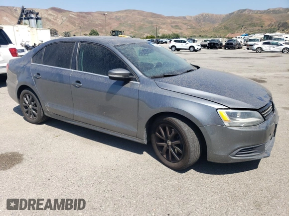 2013 Volkswagen Jetta SE with VIN 3VWDP7AJ5DM355176, listed as a Copart auction lot 60324525 with 192,226 mi miles and Salvage title. Bid and sale history available at DreamBid. Image 4.