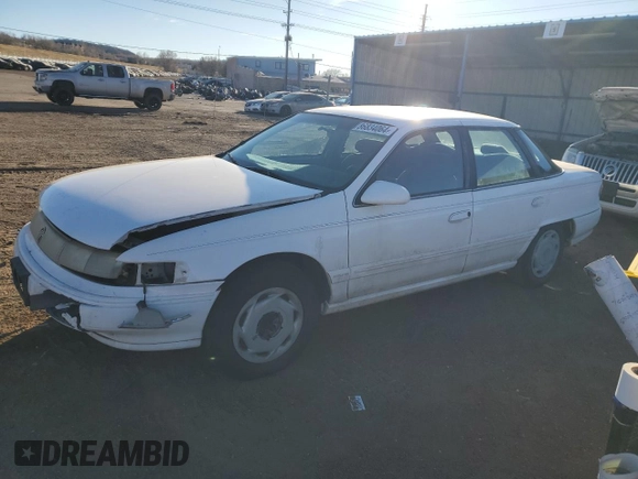 1995 Mercury Sable GS z VIN 1MELM50UXSG617772, wystawiony jako Copart lot #86834064 z przebiegiem 120 994 mil mil oraz Szkody całkowita. Historia ofert i sprzedaży dostępna na DreamBid. Obrazek 1.