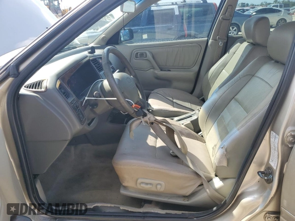 2002 Infiniti G20 Luxury z VIN JNKCP11A12T501940, wystawiony jako Copart lot #74041014 z przebiegiem Nie podano mil oraz Szkoda całkowita • Salvage title. Historia ofert i sprzedaży dostępna na DreamBid. Obrazek 7.