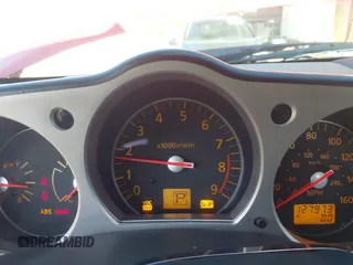 2007 Nissan 350Z Touring with VIN JN1BZ34E87M550297, listed as a IAAI auction lot 41993683 with 127,973 mi miles. Bid and sale history available at carsss.com. Image 7.