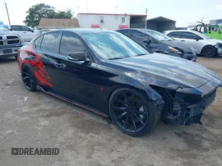 2015 Infiniti Q50 Premium z VIN JN1BV7AR8FM398319, wystawiony jako IAAI lot #42170789 z przebiegiem 86 108 mil mil oraz . Historia ofert i sprzedaży dostępna na DreamBid. Obrazek 1.