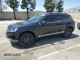 2016 Volkswagen Touareg Sport with VIN WVGEF9BP0GD007399, listed as a Copart auction lot 53990675 with 110,439 mi miles and Salvage Title. Bid and sale history available at DreamBid. Image 1.