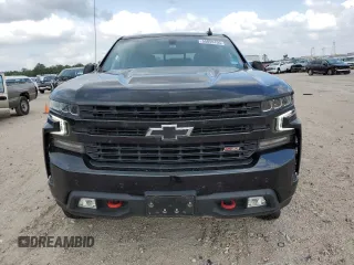 2021 Chevrolet Silverado 1500 LT Trail Boss with VIN 3GCPYFEL6MG114129, listed as a Copart auction lot 55055105 with 77,564 mi miles and Salvage Title. Bid and sale history available at DreamBid. Image 5.