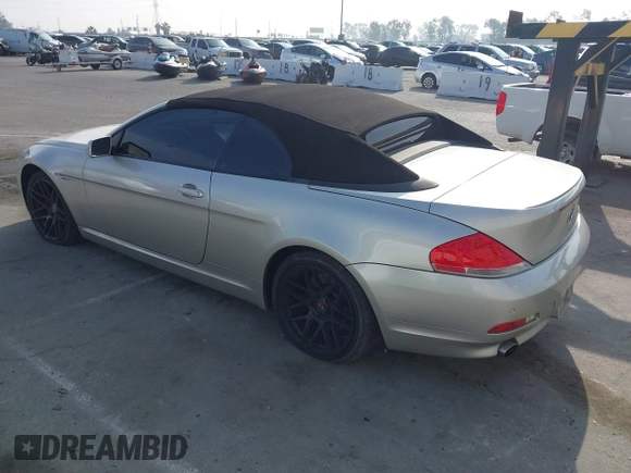 2006 BMW 6 Series 650Ci z VIN WBAEK13486CN72278, wystawiony jako IAAI lot #41119321 z przebiegiem 170 553 mil mil oraz . Historia ofert i sprzedaży dostępna na DreamBid. Obrazek 3.