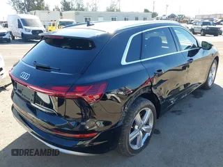 2019 Audi e-tron Premium Plus with VIN WA1LAAGE9KB021724, listed as a IAAI auction lot 41643596 with 34,804 mi miles. Bid and sale history available at carsss.com. Image 4.