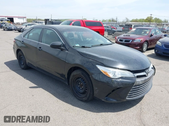 2015 Toyota Camry LE with VIN 4T1BD1FKXFU164963, listed as a IAAI auction lot 42132724 with 141,089 mi miles and . Bid and sale history available at DreamBid. Image 1.