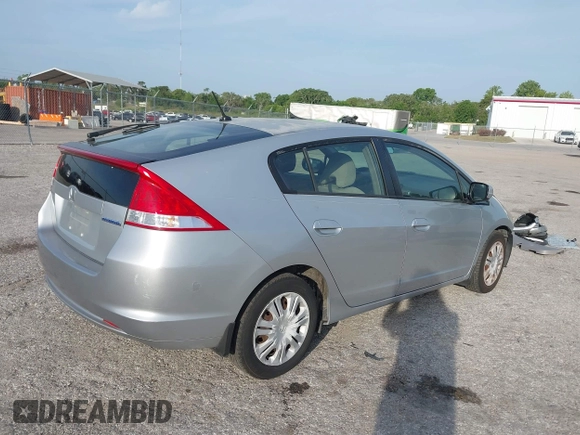 2010 Honda Insight LX with VIN JHMZE2H55AS039854, listed as a IAAI auction lot 42086147 with 153,555 mi miles and . Bid and sale history available at DreamBid. Image 4.