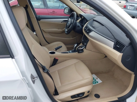 2015 BMW X1 sDrive28i with VIN WBAVM1C50FV314957, listed as a IAAI auction lot 41816402 with 148,410 mi miles. Bid and sale history available at carsss.com. Image 5.