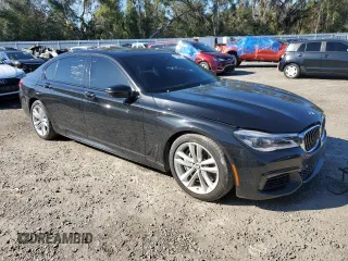 2016 BMW 7 Series 750i with VIN WBA7F0C5XGGL99549, listed as a Copart auction lot 41880015 with 54,181 mi miles and Salvage Title. Bid and sale history available at carsss.com. Image 4.