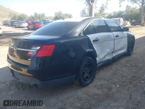 2014 Ford Police Interceptor with VIN 1FAHP2MK4EG124301, listed as a IAAI auction lot 41596193 with 101,314 mi miles and . Bid and sale history available at DreamBid. Image 4.