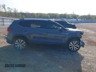2022 Volkswagen Taos SE z VIN 3VVLX7B26NM077297, wystawiony jako IAAI lot #41846563 z przebiegiem 63 161 mil mil oraz . Historia ofert i sprzedaży dostępna na DreamBid. Obrazek 14.