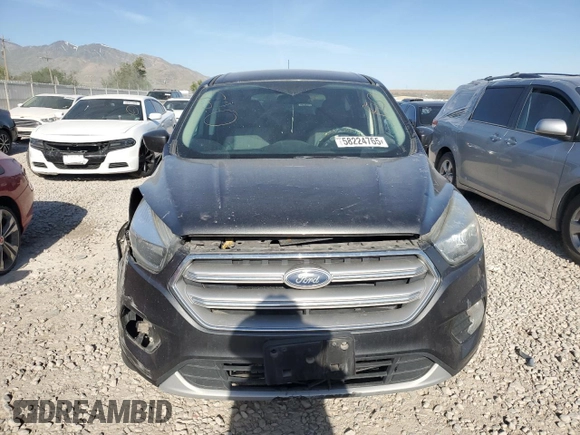 2017 Ford Escape SE z VIN 1FMCU0GD3HUF08778, wystawiony jako Copart lot #58224765 z przebiegiem 67 211 mil mil oraz Szkoda całkowita • Salvage title. Historia ofert i sprzedaży dostępna na DreamBid. Obrazek 5.