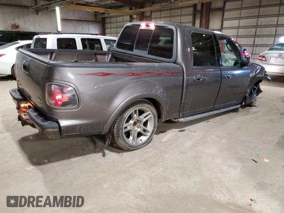 2002 Ford F-150 Harley Davidson with VIN 1FTRW07392KE05237, listed as a Copart auction lot 87451334 with 175,986 mi miles and Salvage Title. Bid and sale history available at carsss.com. Image 3.