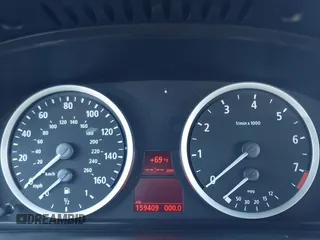2007 BMW 5 Series 530i with VIN WBANE73517CM44520, listed as a IAAI auction lot 41840677 with 159,409 mi miles. Bid and sale history available at carsss.com. Image 7.