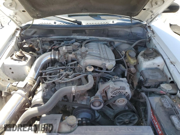 1995 Ford Mustang z VIN 1FALP4043SF252513, wystawiony jako Copart lot #52131605 z przebiegiem 237 066 mil mil oraz Szkoda całkowita • Salvage title. Historia ofert i sprzedaży dostępna na DreamBid. Obrazek 13.