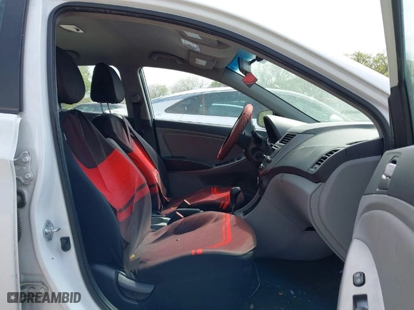 2017 Hyundai Accent SE with VIN KMHCT5AE4HU313404, listed as a IAAI auction lot 42035860 with 123,951 mi miles. Bid and sale history available at carsss.com. Image 5.