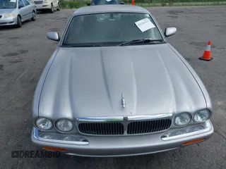 2000 Jaguar XJ with VIN SAJDA14C4YLF13470, listed as a IAAI auction lot 42136313 with 237,063 mi miles and . Bid and sale history available at DreamBid. Image 6.
