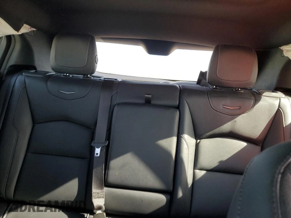 2023 Cadillac XT4 FWD Sport with VIN 1GYFZER47PF107311, listed as a Copart auction lot 87583565 with 26,585 mi miles and Salvage title. Bid and sale history available at DreamBid. Image 10.
