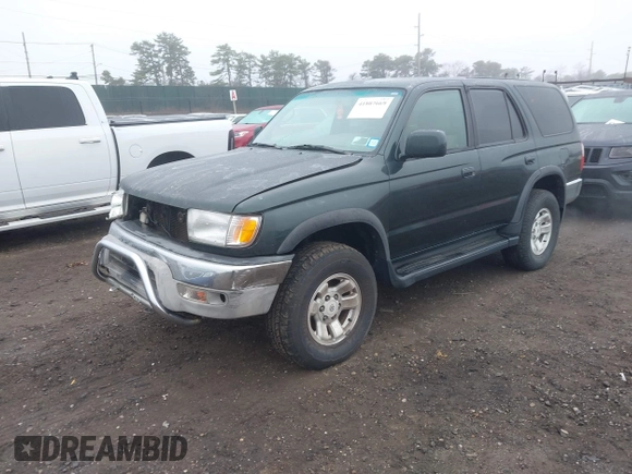 1999 Toyota 4Runner SR5 z VIN JT3HN86R4X0198993, wystawiony jako IAAI lot #41807669 z przebiegiem 187 269 mil mil oraz . Historia ofert i sprzedaży dostępna na DreamBid. Obrazek 2.