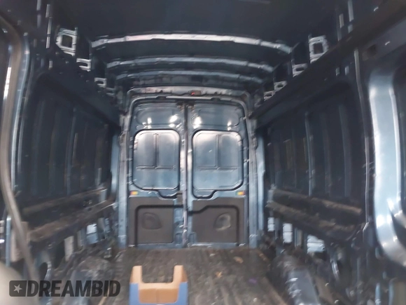 2023 Ford Transit Cargo z VIN 1FTBR3X86PKA19968, wystawiony jako IAAI lot #41587524 z przebiegiem 44 987 mil mil oraz . Historia ofert i sprzedaży dostępna na DreamBid. Obrazek 8.