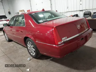 2009 Cadillac DTS w/1SA with VIN 1G6KD57Y59U149387, listed as a IAAI auction lot 41957750 with 94,939 mi miles. Bid and sale history available at carsss.com. Image 3.