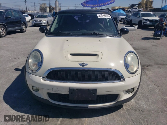 2009 MINI Hardtop S with VIN WMWMF73569TW80561, listed as a Copart auction lot 52615805 with 109,968 mi miles and Salvage title. Bid and sale history available at DreamBid. Image 5.