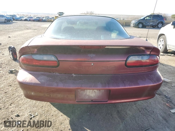 1994 Chevrolet Camaro z VIN 2G1FP22S4R2112885, wystawiony jako Copart lot #83088874 z przebiegiem 120 416 mil mil oraz Czysty tytuł • Clean title. Historia ofert i sprzedaży dostępna na DreamBid. Obrazek 6.
