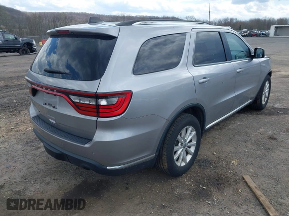 2015 Dodge Durango SXT with VIN 1C4RDJAG3FC746026, listed as a IAAI auction lot 42040152 with 126,370 mi miles and . Bid and sale history available at carsss.com. Image 4.