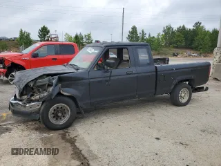 1990 Ford Ranger with VIN 1FTCR14X3LPB15204, listed as a Copart auction lot 59538645 with 77,303 mi miles and Salvage title. Bid and sale history available at DreamBid. Image 1.