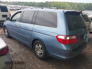 2005 Honda Odyssey EX-L with VIN 5FNRL38685B113633, listed as a IAAI auction lot 42035706 with 320,335 mi miles. Bid and sale history available at carsss.com. Image 3.