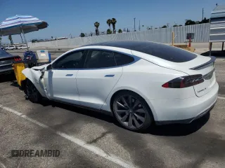 2013 Tesla Model S Performance с VIN 5YJSA1DP3DFP10567, выставлен на аукционе Copart как лот 58352955 с пробегом 128 438 миль миль и Списание • Salvage title. История ставок и продаж доступна на DreamBid. Изображение 2.