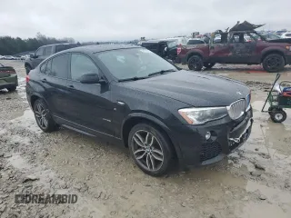 2015 BMW X4 xDrive28i with VIN 5UXXW3C57F0M87498, listed as a Copart auction lot 45154904 with 153,631 mi miles. Bid and sale history available at carsss.com. Image 4.
