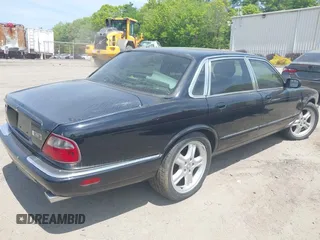 1999 Jaguar XJ with VIN SAJPX1841XC864072, listed as a IAAI auction lot 42176220 with 122,712 mi miles and . Bid and sale history available at DreamBid. Image 4.