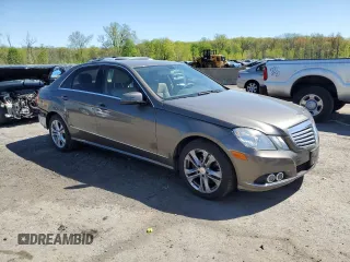 2011 Mercedes-Benz E 350 Luxury with VIN WDDHF8HB6BA485141, listed as a Copart auction lot 54916515 with 113,390 mi miles and Salvage Title. Bid and sale history available at DreamBid. Image 4.