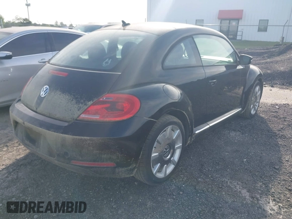 2013 Volkswagen Beetle 2.5L with VIN 3VWJP7AT1DM608370, listed as a IAAI auction lot 42088900 with Not Provided miles and . Bid and sale history available at DreamBid. Image 4.