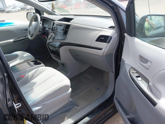 2014 Toyota Sienna LE AAS with VIN 5TDKK3DC6ES499478, listed as a IAAI auction lot 41918474 with 127,734 mi miles and . Bid and sale history available at carsss.com. Image 5.