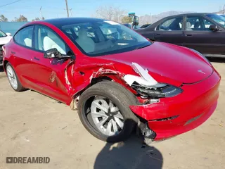 2021 Tesla Model 3 Long Range with VIN 5YJ3E1EBXMF990242, listed as a IAAI auction lot 41674222 with 24,554 mi miles. Bid and sale history available at carsss.com. Image 1.
