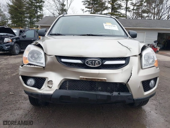 2009 Kia Sportage LX with VIN KNDJE723397628211, listed as a IAAI auction lot 41744526 with 136,811 mi miles. Bid and sale history available at carsss.com. Image 6.