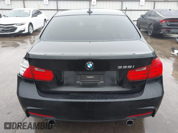 2014 BMW 3 Series 335i with VIN WBA3A9C57EF477662, listed as a IAAI auction lot 41435544 with 129,543 mi miles. Bid and sale history available at carsss.com. Image 17.