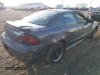 2005 Pontiac Grand Am SE with VIN 1G2NE52E75M151497, listed as a IAAI auction lot 40847757 with 140,300 mi miles. Bid and sale history available at carsss.com. Image 4.