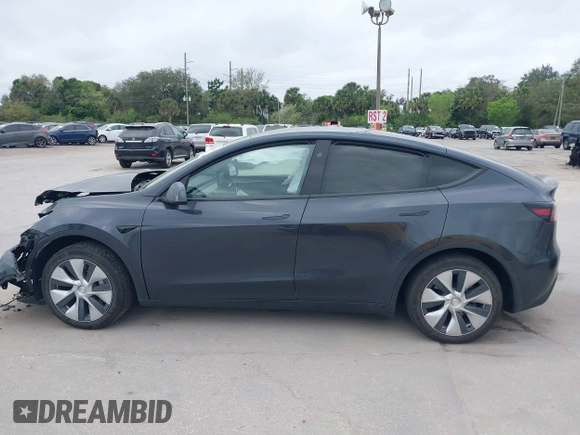 2024 Tesla Model Y with VIN 7SAYGDED3RF002246, listed as a IAAI auction lot 41566184 with 10,316 mi miles and . Bid and sale history available at DreamBid. Image 13.